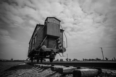 Low angle view of abandoned ship against sky