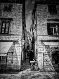 Narrow alley amidst old buildings