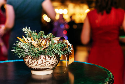 Close-up of illuminated candles on table