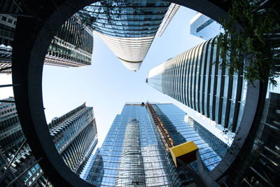 Low angle view of modern buildings against sky