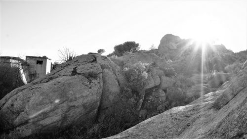 Panoramic shot of rocks against clear sky