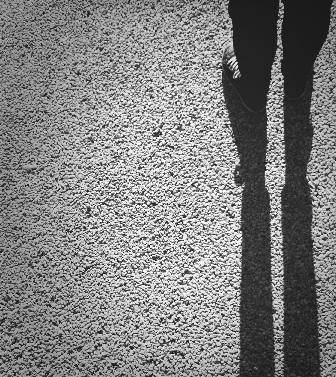 low section, person, standing, lifestyles, men, unrecognizable person, leisure activity, textured, walking, pattern, outdoors, shadow, day, human foot, part of, sunlight