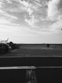 Road against cloudy sky