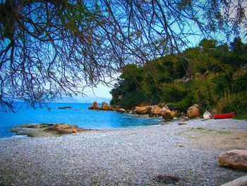 Scenic view of sea against blue sky