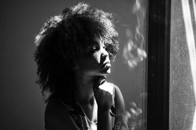 Close-up of thoughtful woman looking away