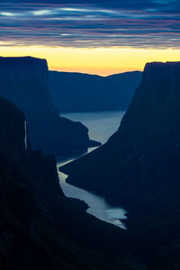 Scenic view of sea against sky during sunset in gros morne national park, newfoundland, canada