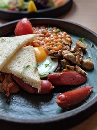 Close-up of breakfast served in plate