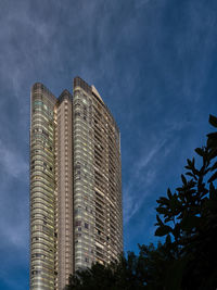 Low angle view of modern buildings against sky