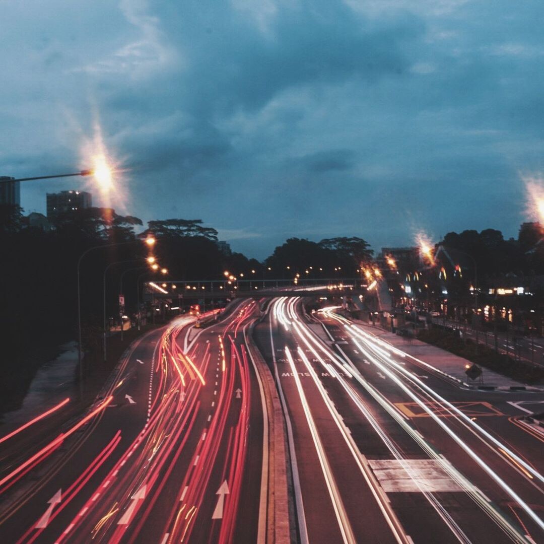 High angle view of light trails on road at night