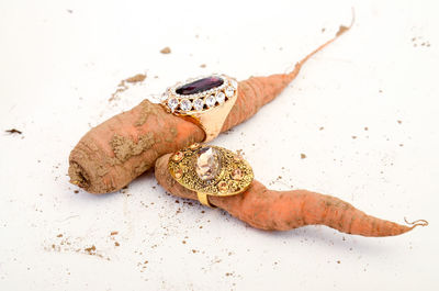 Picture of a fashion ring on a raw carrot