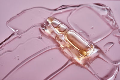 High angle view of water splashing against white background