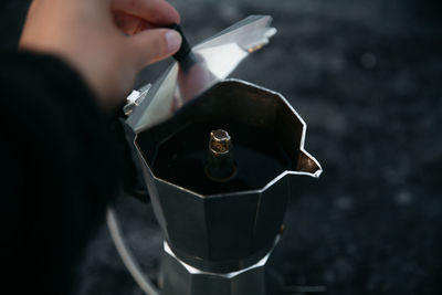 Close-up of man holding coffee