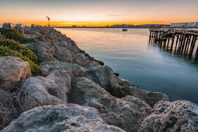 Scenic view of sea against sky during sunset