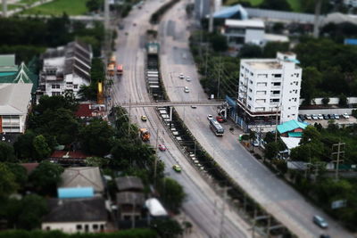 High angle view of street amidst buildings in city