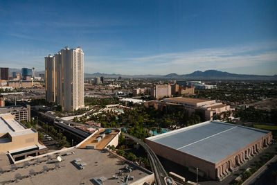 High angle view of buildings in city against sky