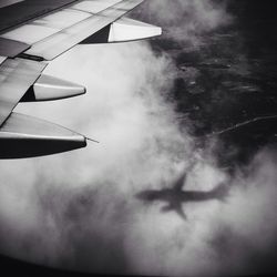 Cropped image of airplane wing