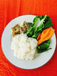 Close-up of salad in plate on table