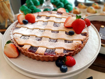 Close-up of strawberry tart dessert in plate on table