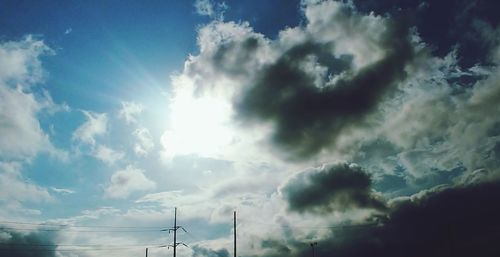 Low angle view of cloudscape against blue sky