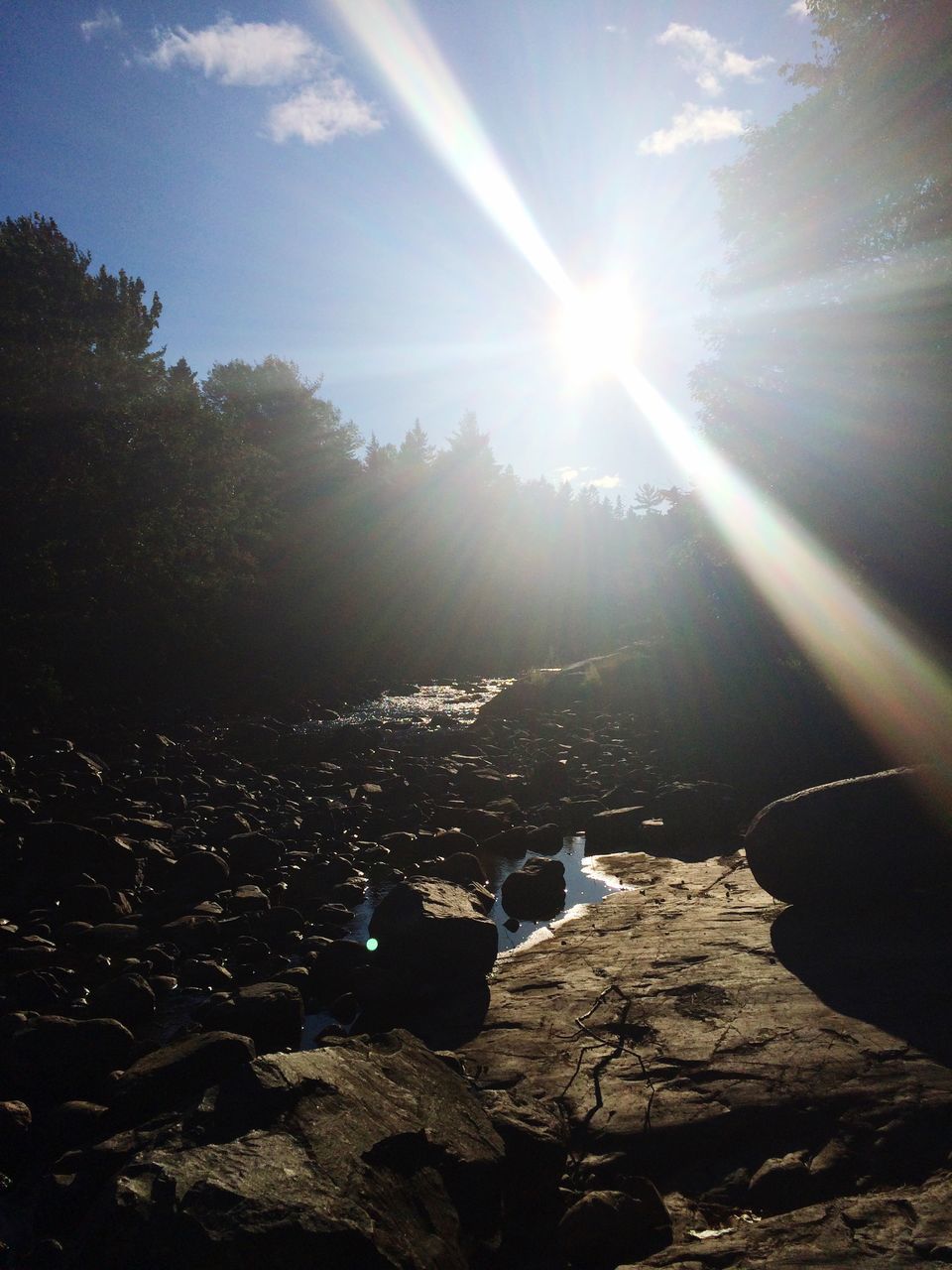 sun, sunbeam, sunlight, lens flare, sunny, built structure, architecture, building exterior, sky, bright, day, nature, outdoors, tree, landscape, shadow, rock - object, shining, no people, tranquility