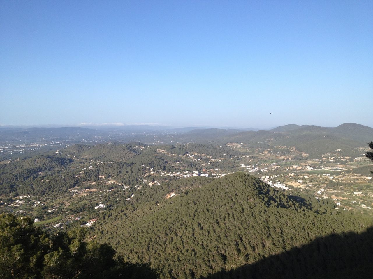 clear sky, copy space, cityscape, blue, landscape, mountain, high angle view, aerial view, city, building exterior, scenics, architecture, built structure, crowded, tranquil scene, residential district, tranquility, beauty in nature, nature, mountain range