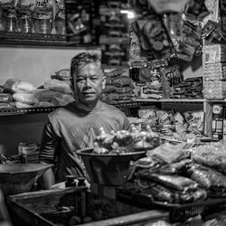 Man having food at store