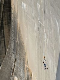 Panoramic view of people on wall