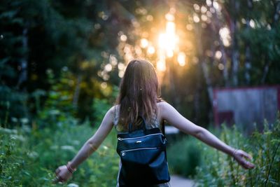 Rear view of woman walking