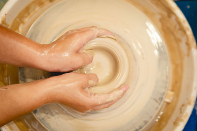 High angle view of person preparing food in kitchen