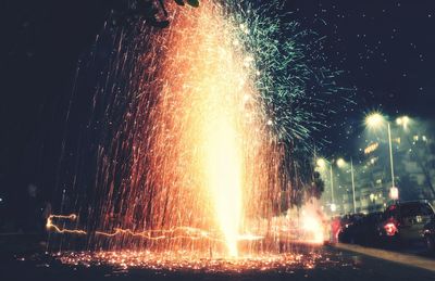 Firework display at night