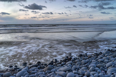 Scenic view of sea against sky during sunset