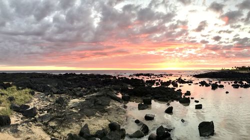 Panoramic view of sea against sky during sunset