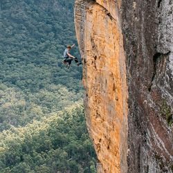 Full length of man standing on rock formation