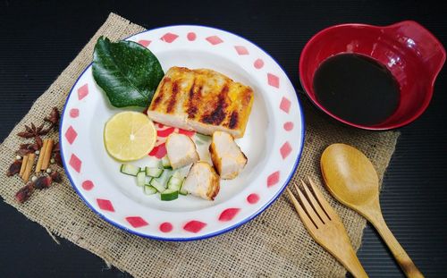 Close-up of food served on table