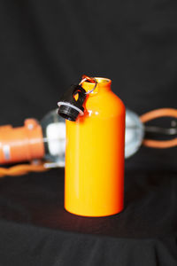 Close-up of orange juice on table