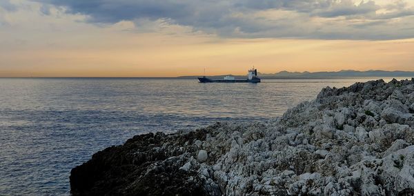 Scenic view of sea against sky during sunset