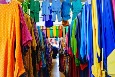 Multi colored flags hanging in store for sale