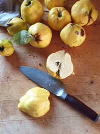 High angle view of quinces on cutting board