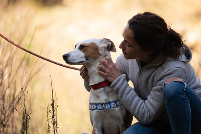 Portrait of woman with dog