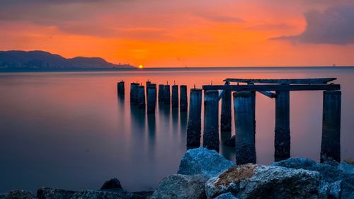 Scenic view of sea against sky during sunset