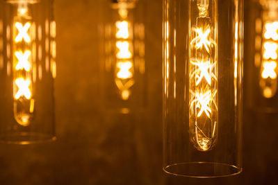 Close-up of illuminated light bulb