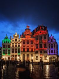 Illuminated brssels grand place against night sky