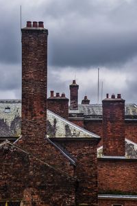 View of bell tower against cloudy sky