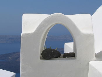 Close-up of cross against the sky