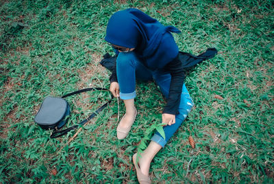 High angle view of man playing on field