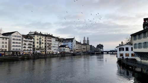 Canal amidst buildings in city