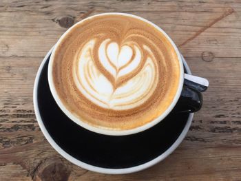 High angle view of cappuccino on table