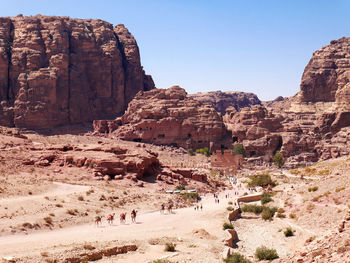 Panoramic view of rock formations against clear sky