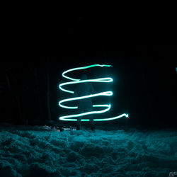 Illuminated light painting at night