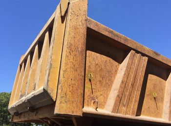 Low angle view of built structure against clear blue sky